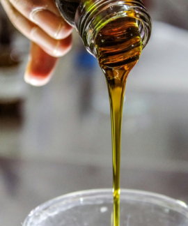 person-holding-clear-drinking-glass-with-brown-liquid.jpg person holding clear drinking glass with brown liquid